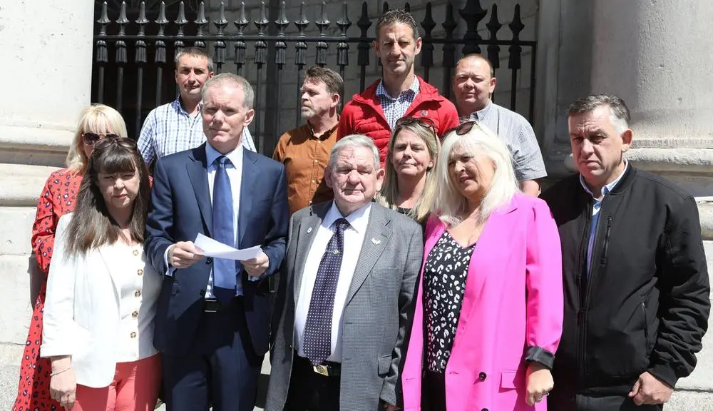 Kathleen Leech family at the Four Courts with Mark Tiernan